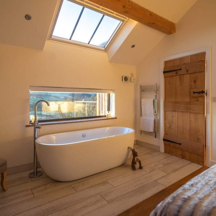 a freestanding bath in a luxury adults only accommodation
